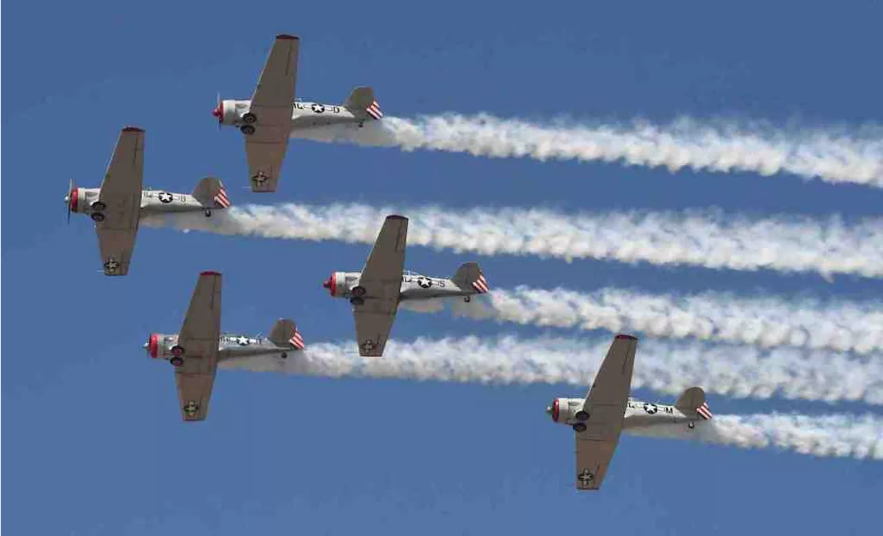 A copter twisted in the air and a Grumman Hellcat flew, at Wings Over Camarillo