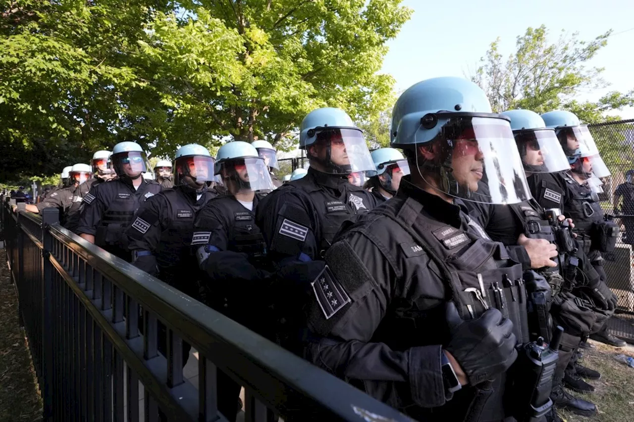 Protesters break through security fence near site of Democratic National Convention