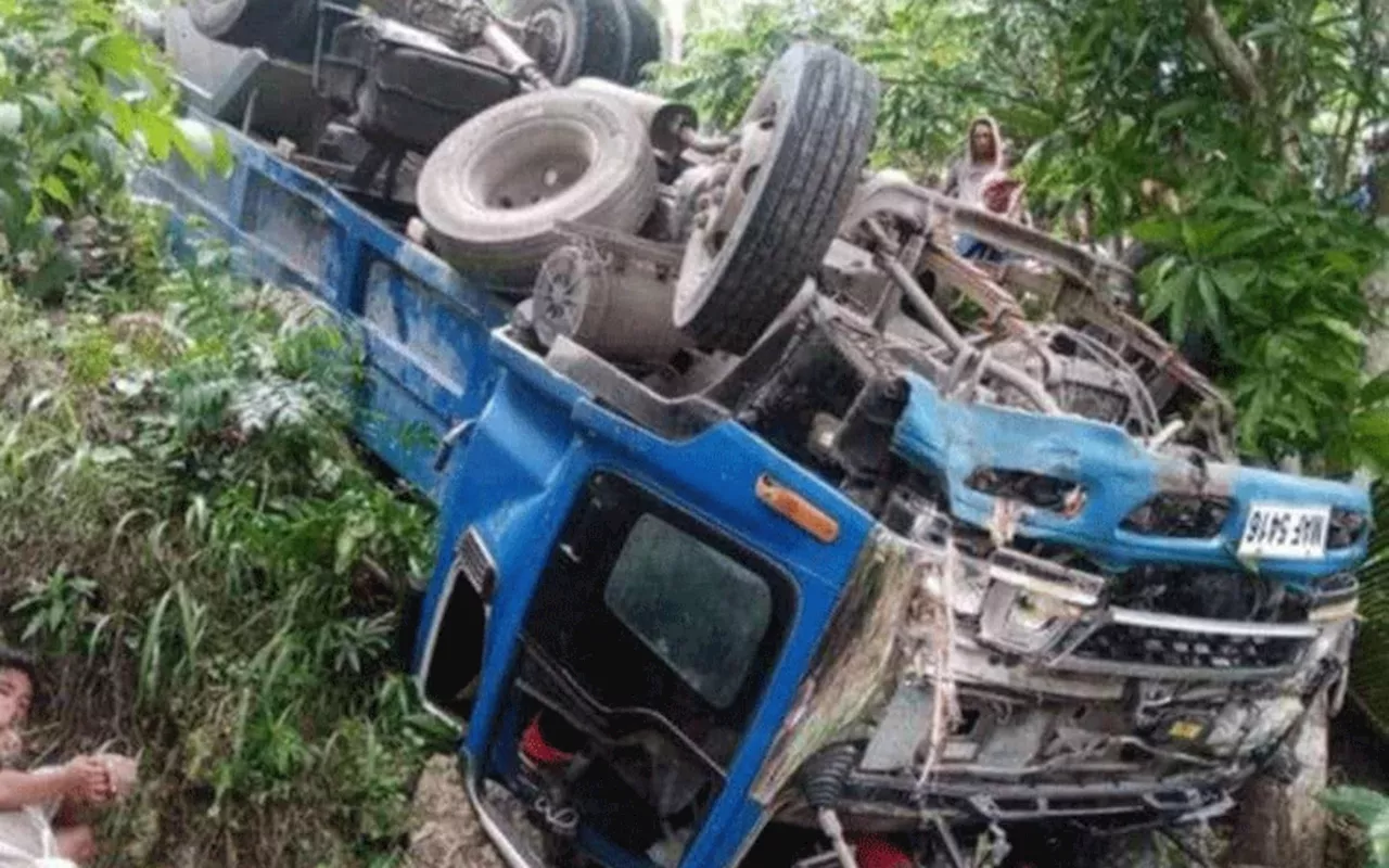 Man dies, 10 others hurt after dump truck falls off cliff in Pinamungajan, Cebu 