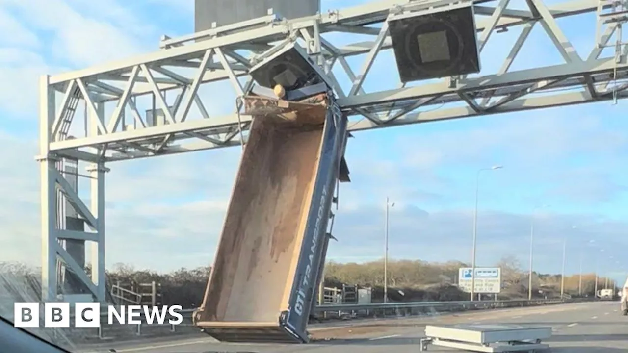 Bristol truck driver who hit M5 gantry banned for one year