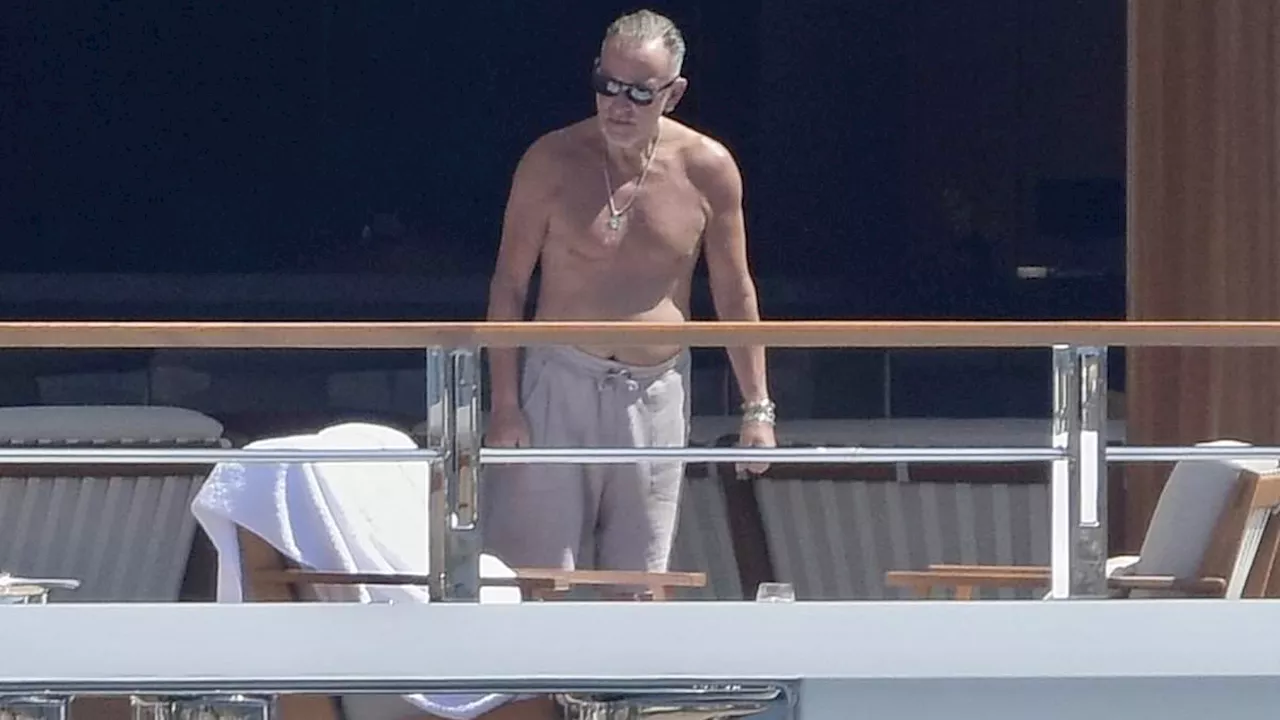 Bruce Springsteen proves he's still The Boss at 74 while parading his buff body on luxury holiday...