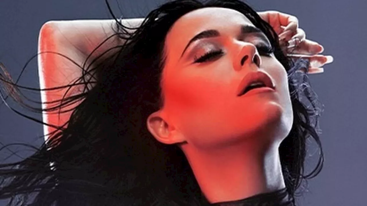 Katy Perry unveils VERY racy alternate 143 album cover - as she desperately tries to salvage...