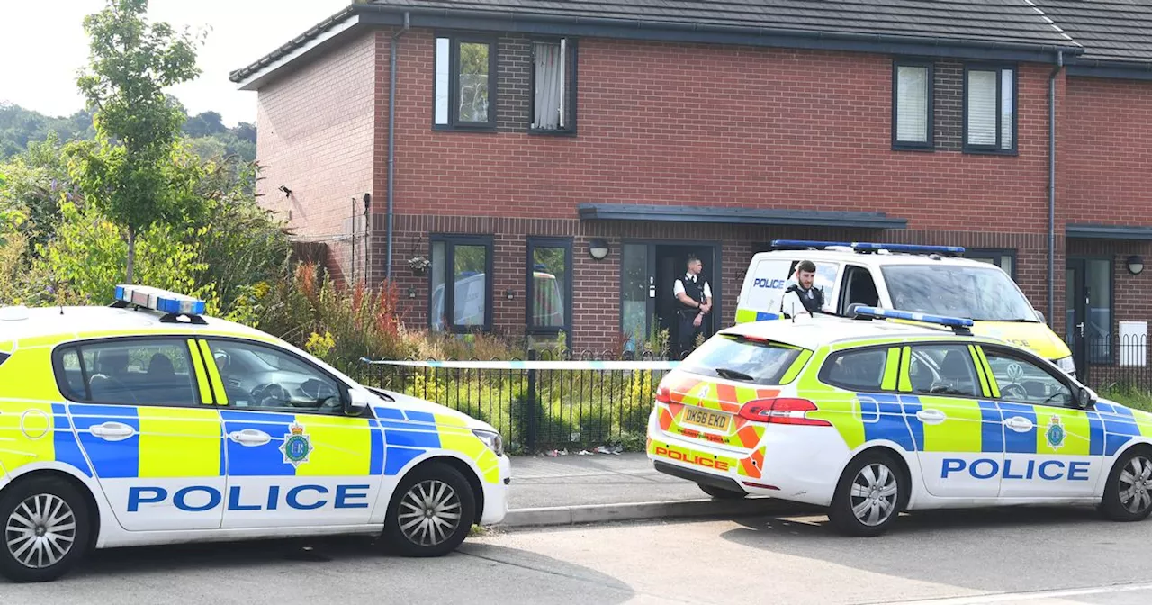 Police remain on scene after murder arrests over man's death