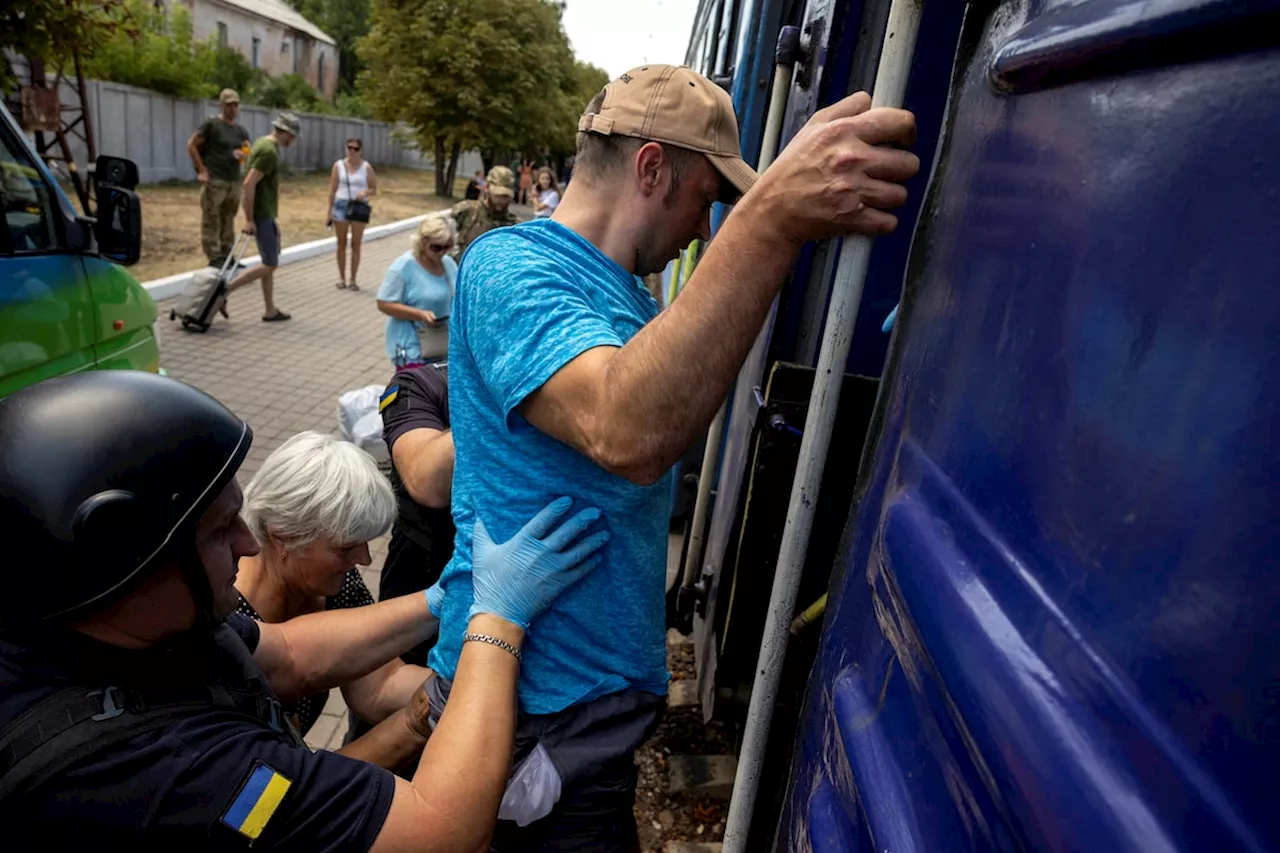 Evacuations increase tenfold in Ukraine’s east as Russia inches forward with bombs and infantry