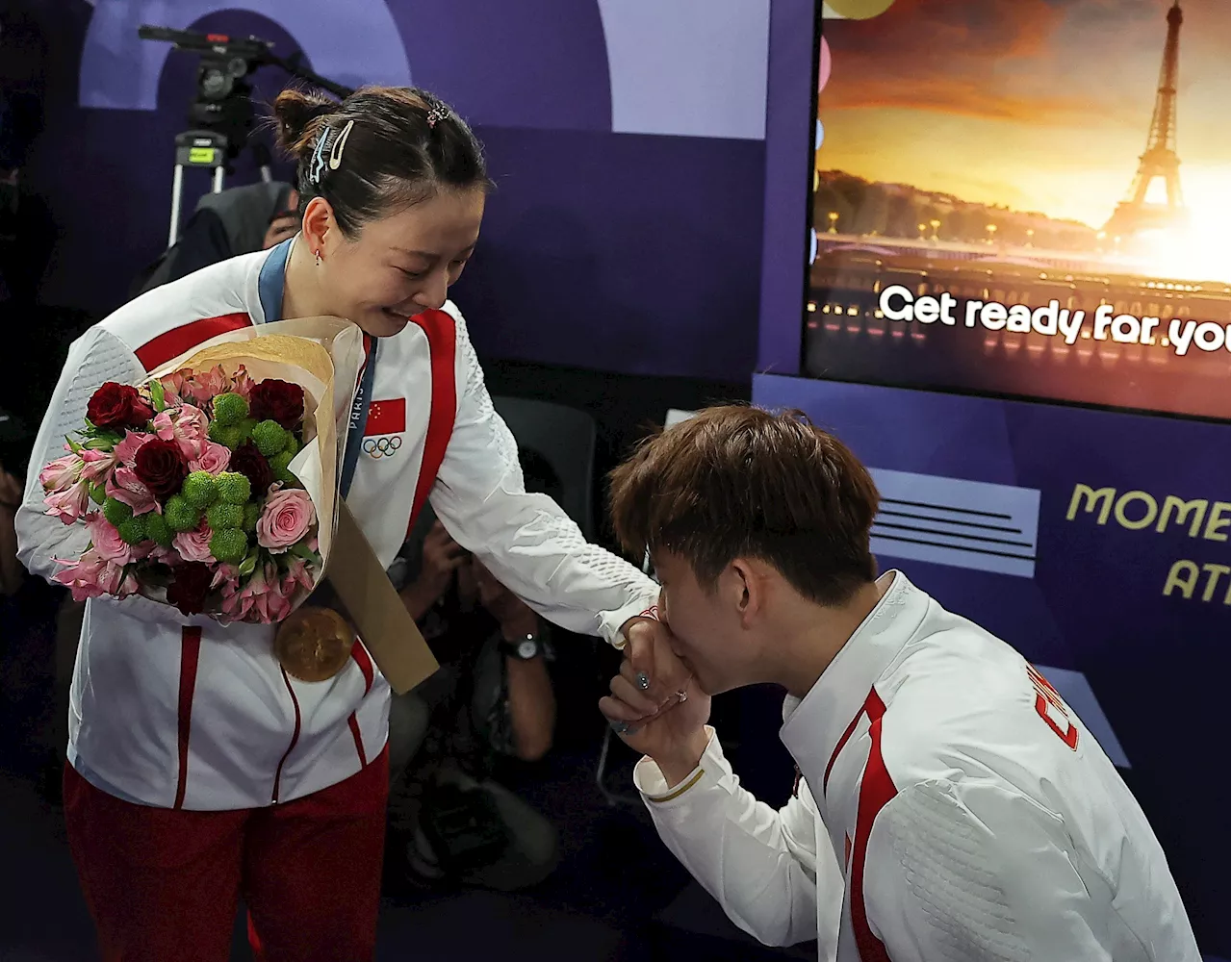 China's Huang leaves Paris with an Olympic gold medal and a diamond ring