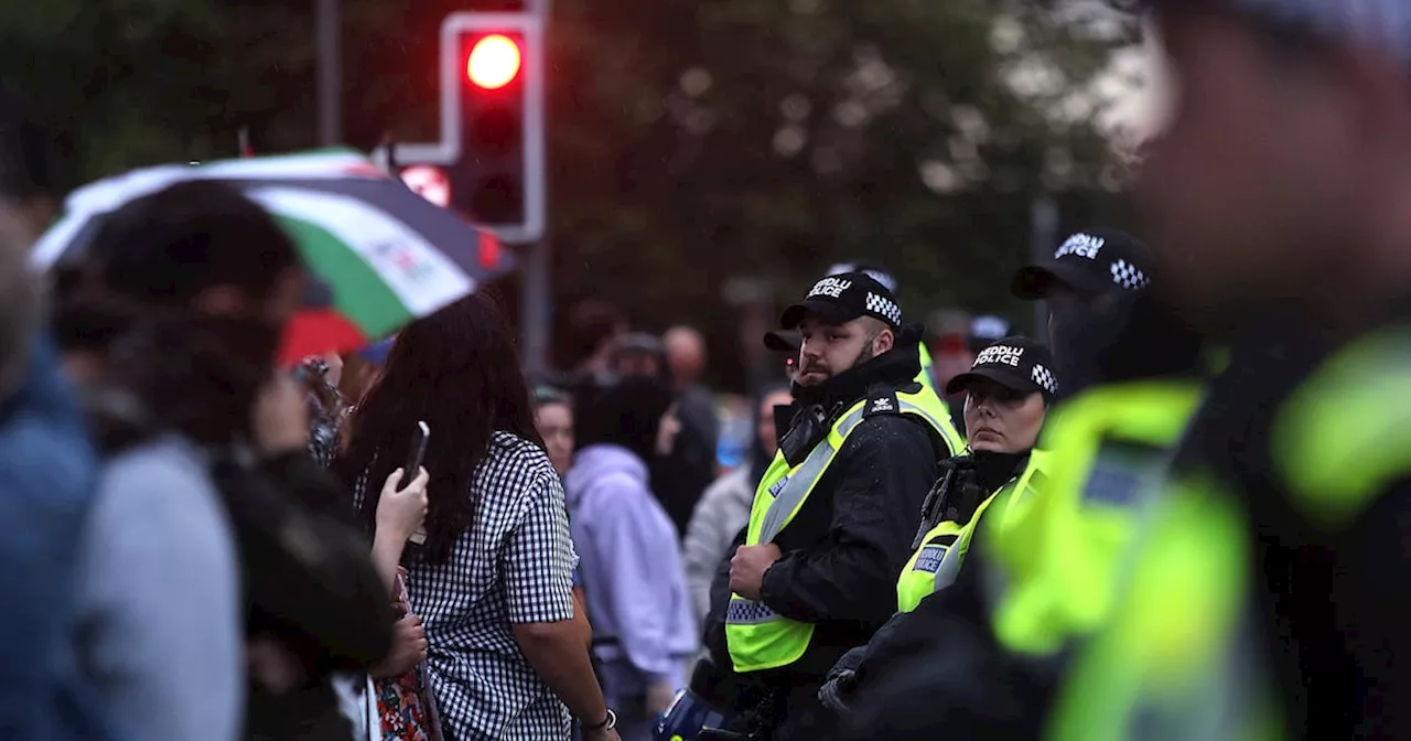 Beer barrels and stones thrown at UK police protecting mosque amid unrest after Southport stabbings