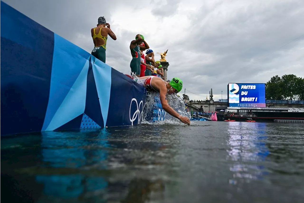 Olympic triathletes swim in Seine River after days of concerns about water quality