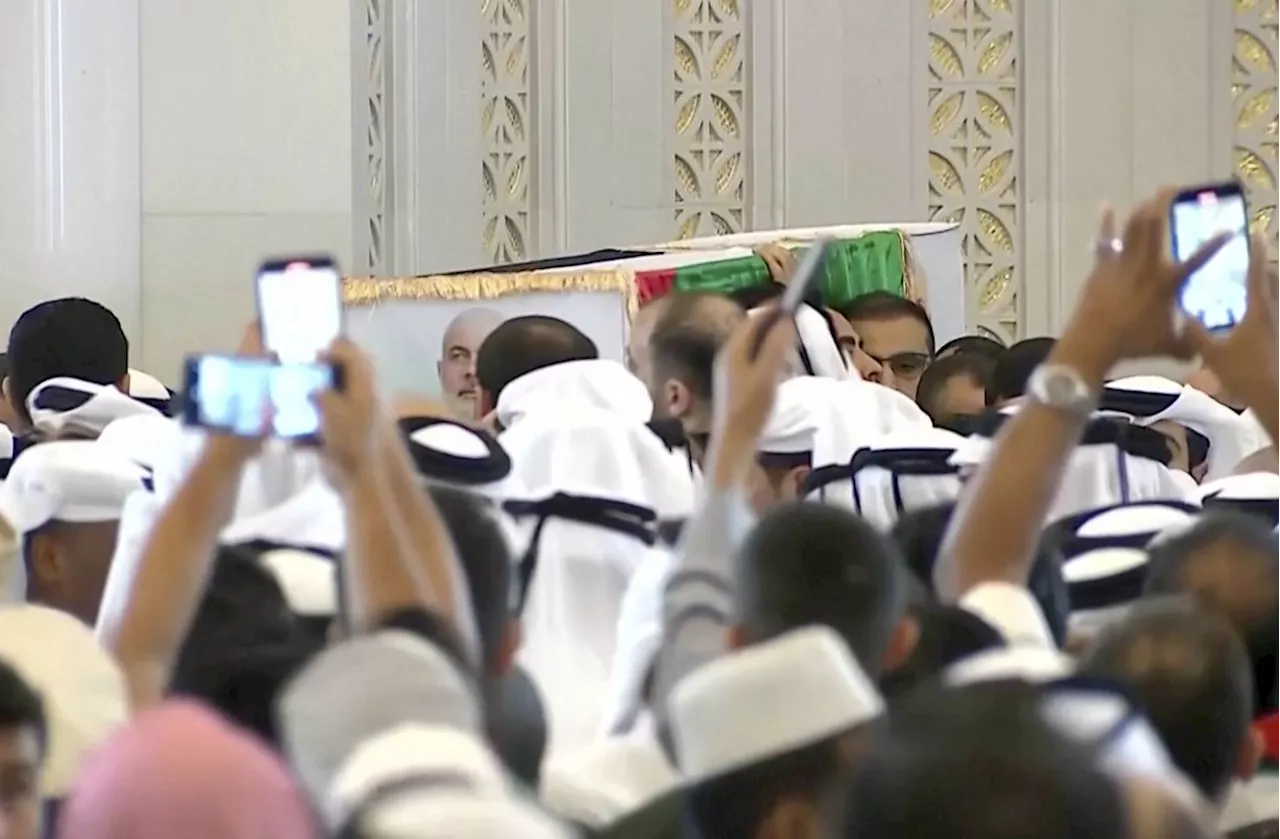 Mourners bury Hamas chief Haniyeh in Qatar as more escalation looms over the Middle East