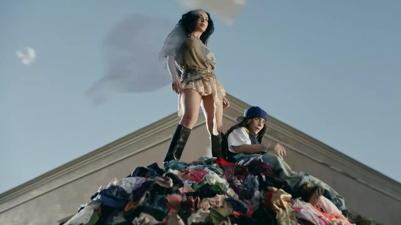 Charli XCX & Billie Eilish Donate “Guess” Video Underwear to Domestic Violence Survivors