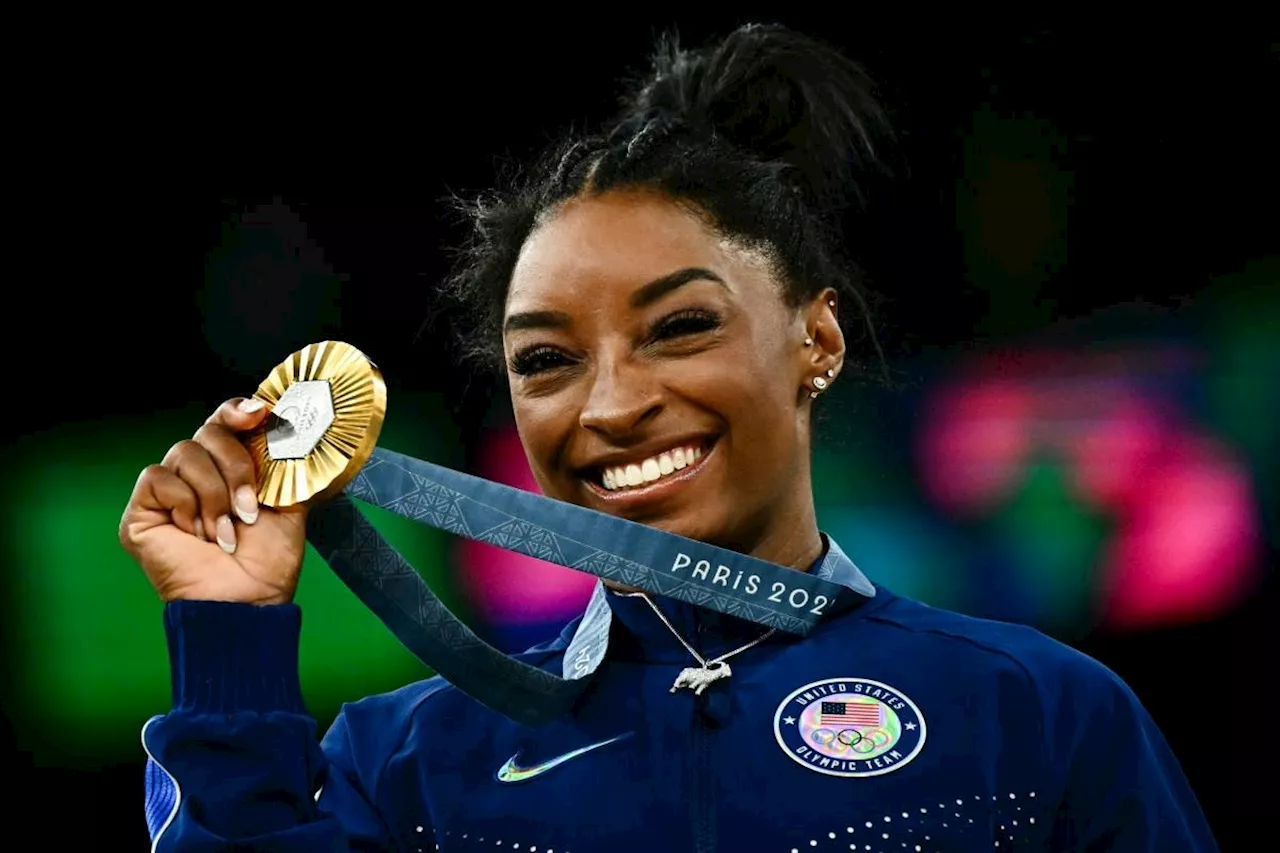 'Just Simone' celebrates GOAT status with Paris all-around gold