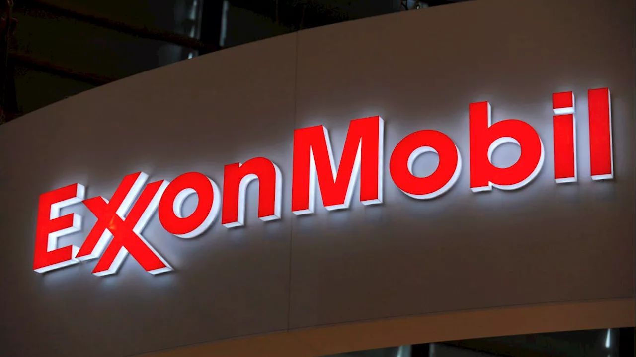 Exxon rises, Chevron falls on earnings results