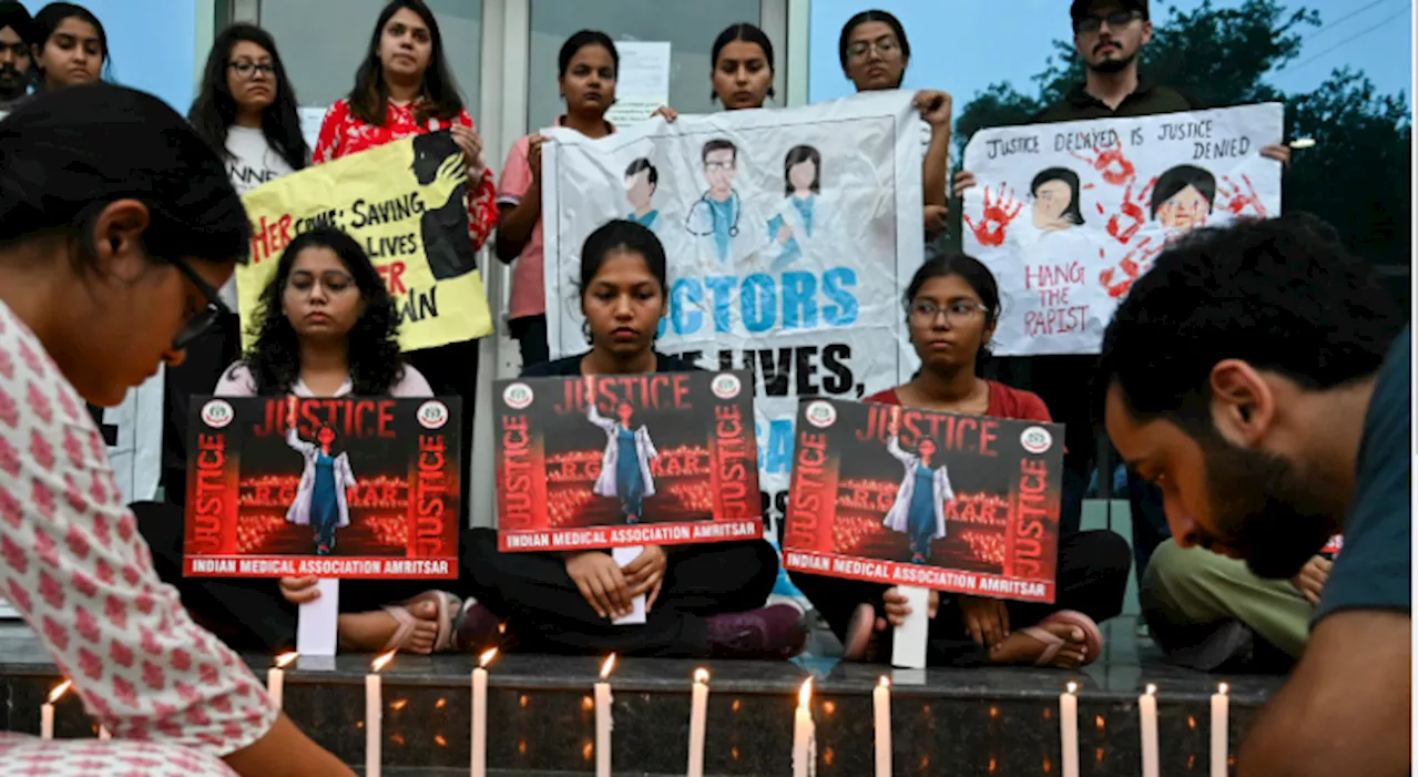 Protests over Indian doctor's rape and murder unite rival soccer fans