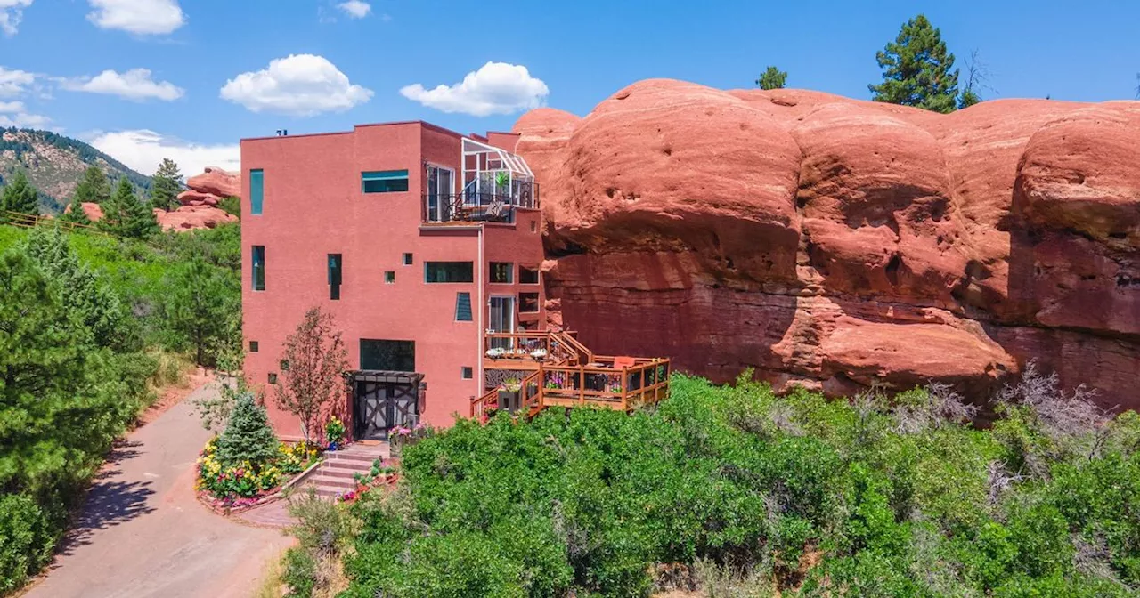 Inside real-life Flintstones home built around a 200 million-year-old red rock