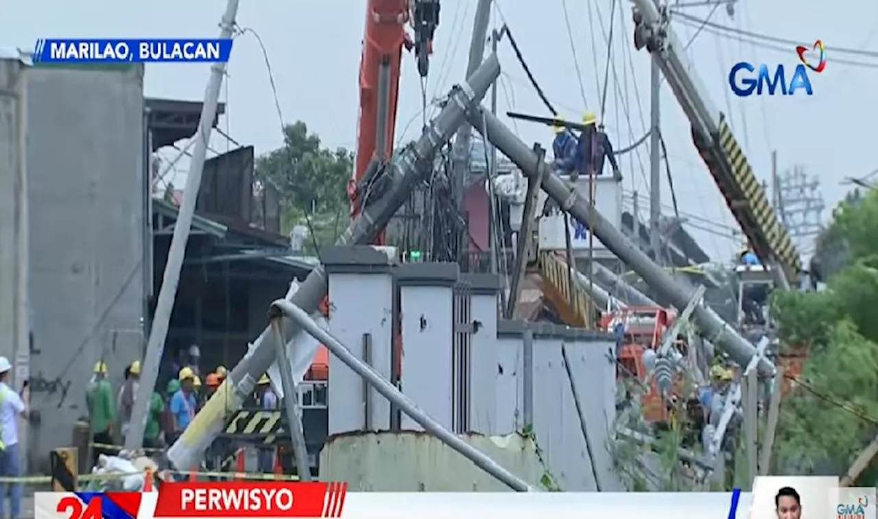 15 poste, natumba nang sumabit sa mga kawad ang isang truck sa Marilao, Bulacan; 2, sugatan