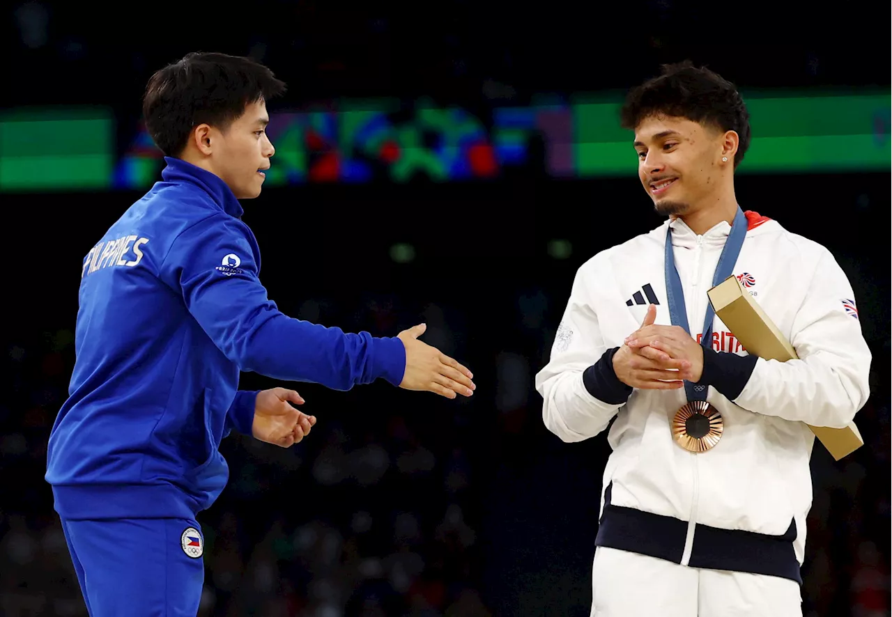 Carlos Yulo reveals Fil-Brit pal Jake Jarman’s assist in his winning Olympic vault gold