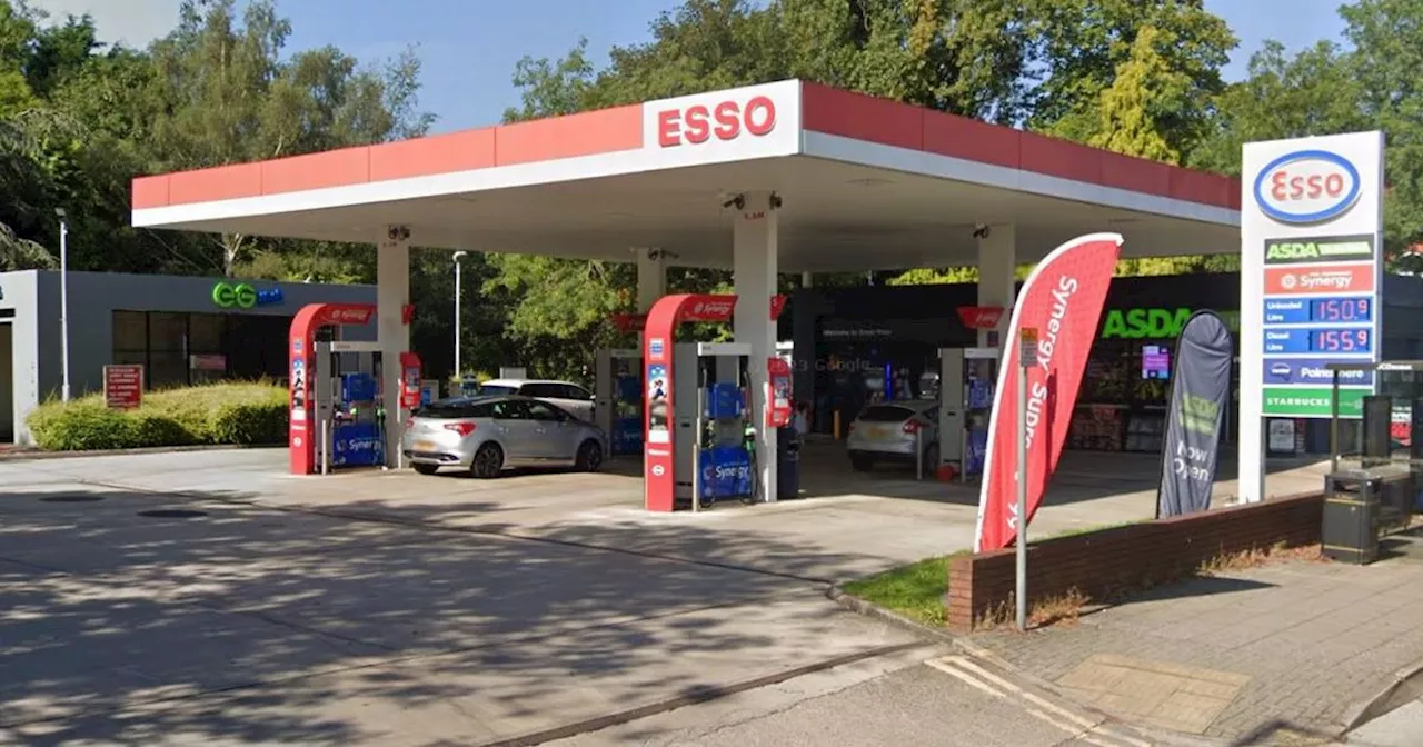 Armed cops storm petrol station on busy Greater Manchester road