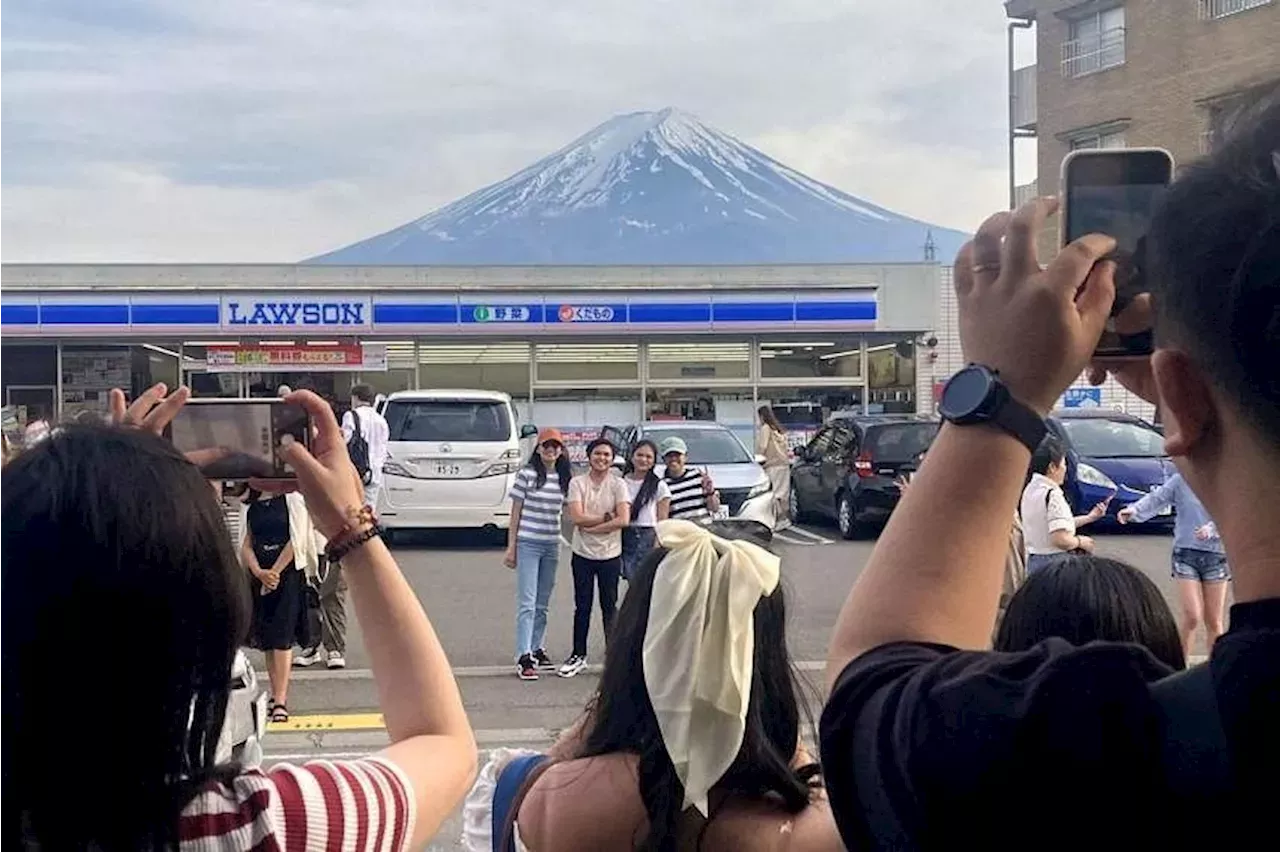 Mt Fuji With tourists away, Mt Fuji barrier taken down in Japan