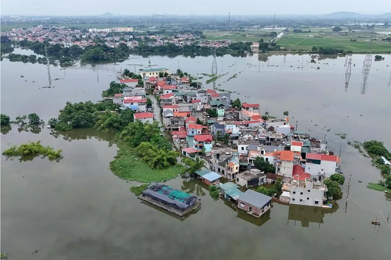 Thousands of children cut off from school by north Vietnam floods