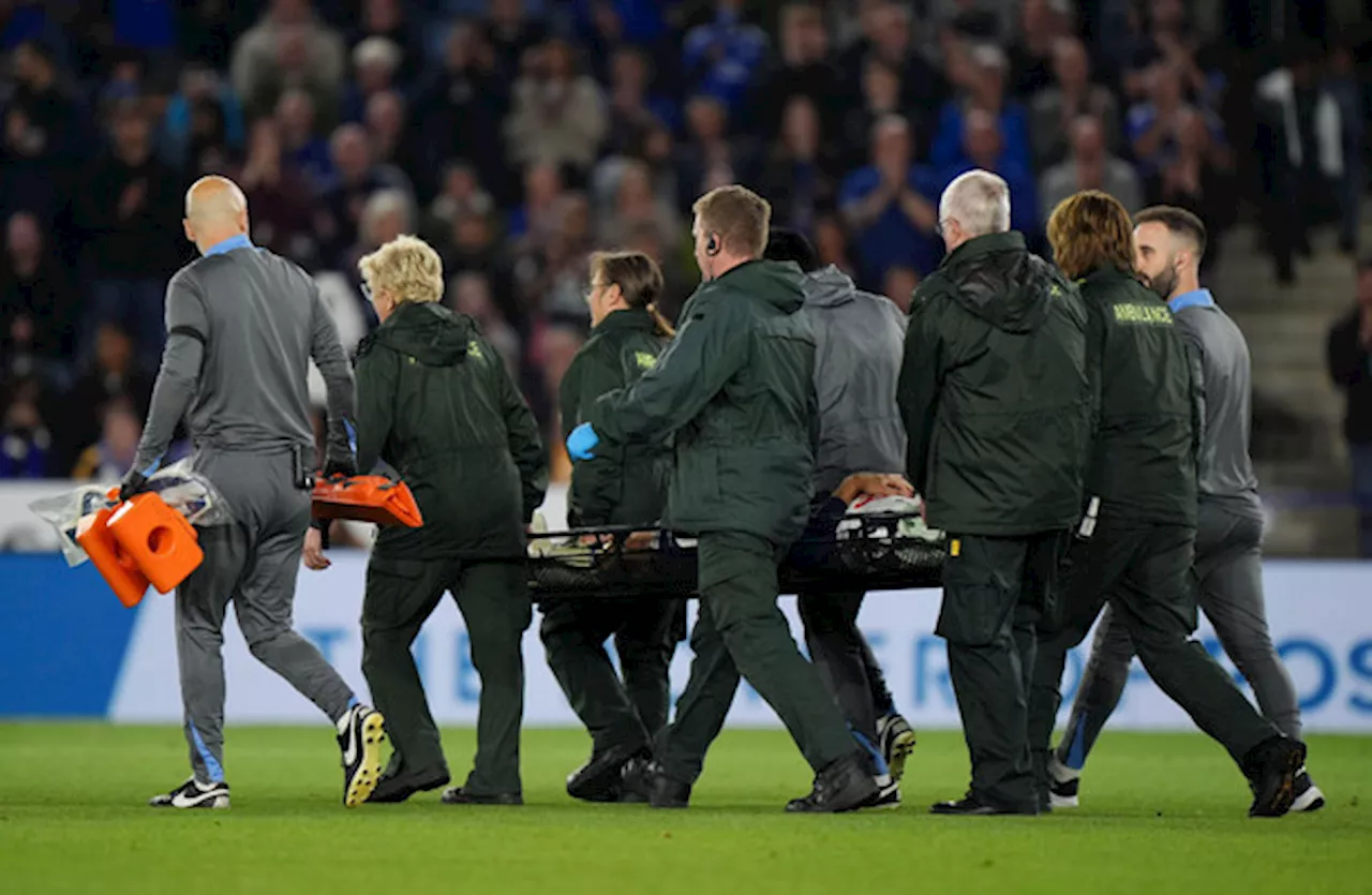 Spurs midfielder 'conscious and communicating' after head injury