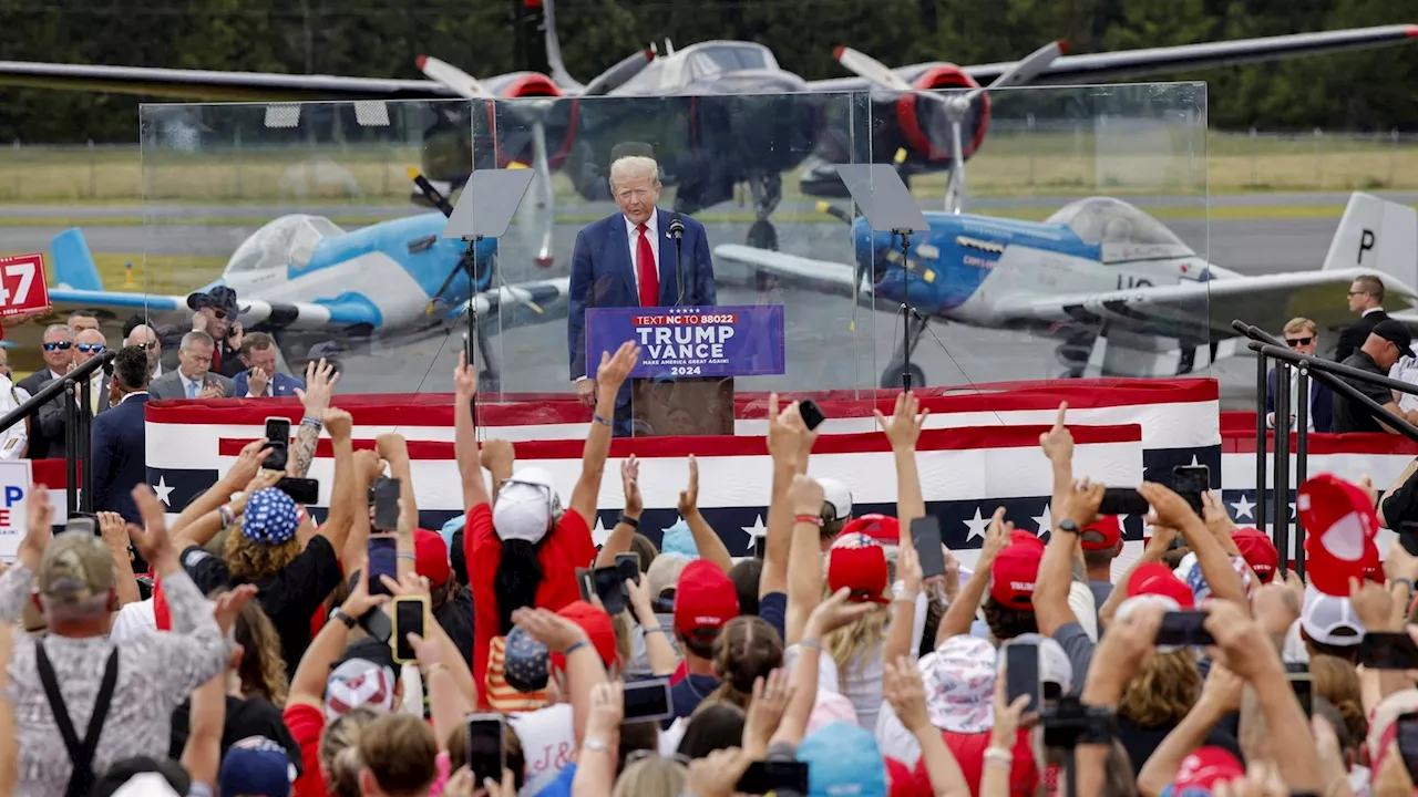 Trump speaks from behind bulletproof glass at 1st outdoor rally since Butler shooting