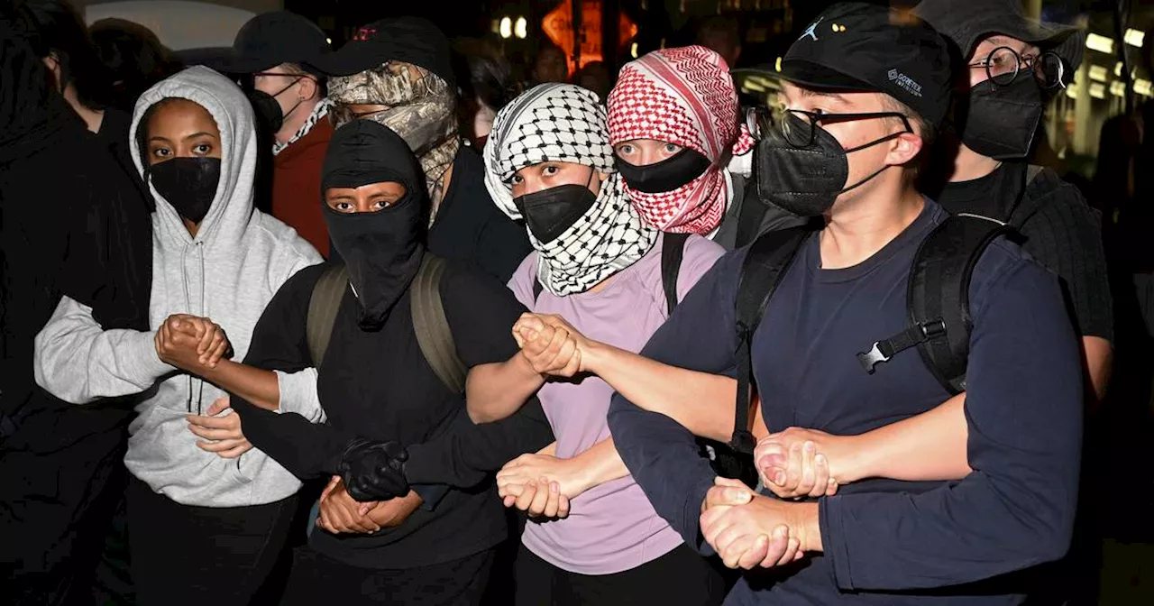 Dozens of protesters arrested after clashes with police outside Israeli Consulate in Chicago during Democratic convention