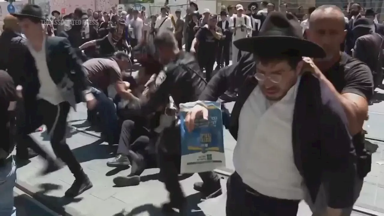 Orthodox Jewish protesters against military service law forcibly removed by police in Jerusalem