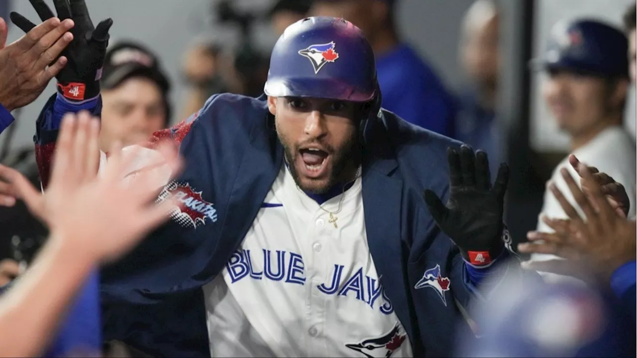 Springer helps homer-happy Blue Jays rout Reds 10-3