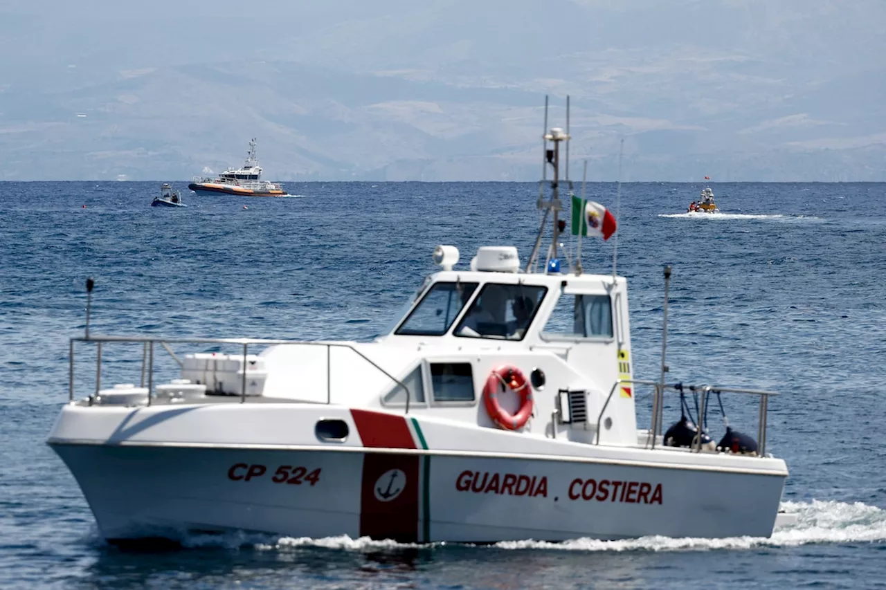 Divers resume search for six people missing after yacht sinks off Sicily, but hopes dim