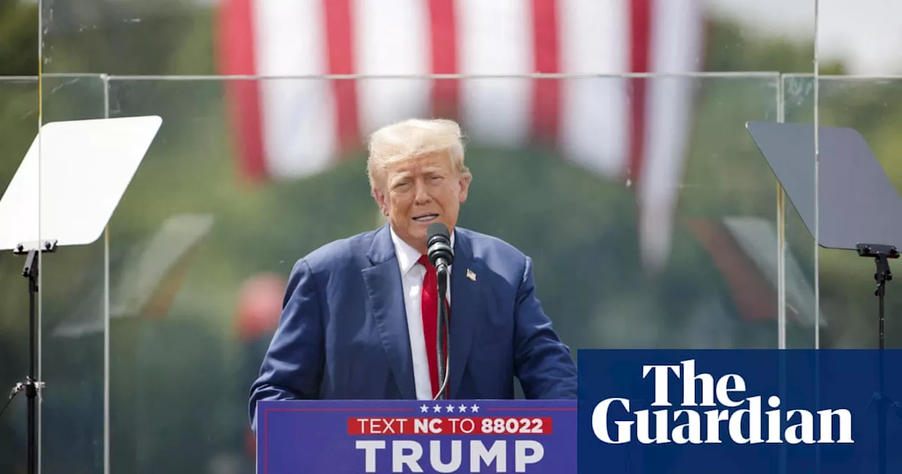 Trump appears behind bulletproof glass in first outdoor rally since shooting