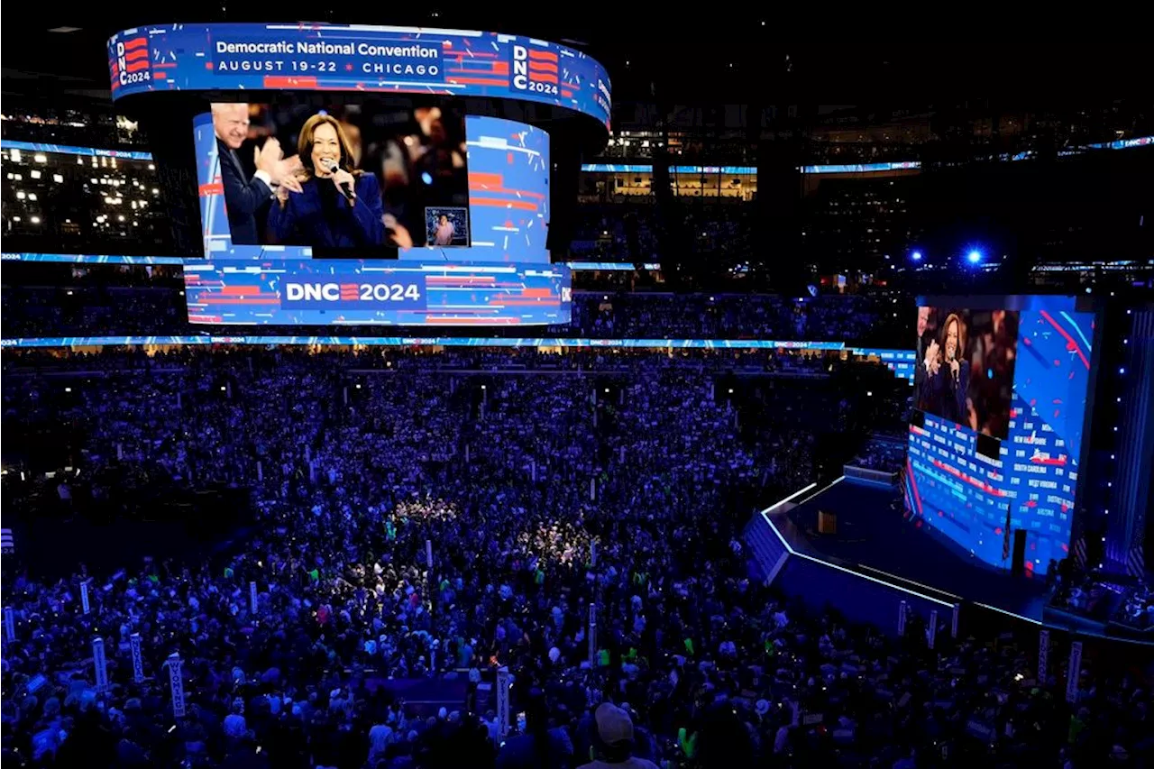 Democrats turn toward Harris at party's convention as the Obamas and Emhoff take center stage