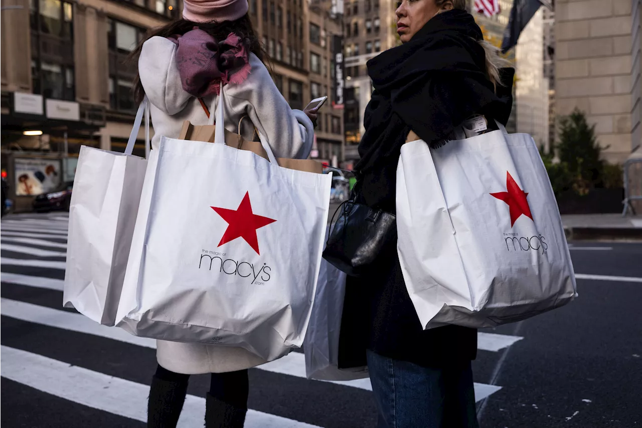 Macy's slashes sales outlook as iconic retailer struggles to lure cash-strapped shoppers