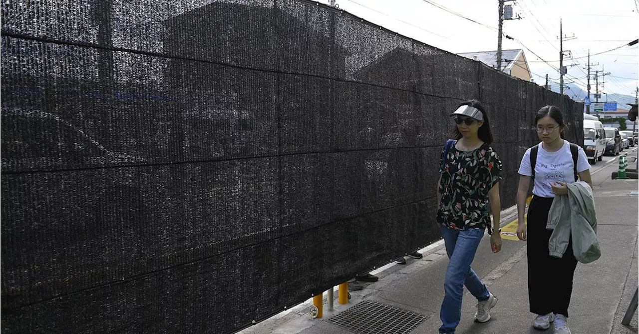 Japanese town quietly removes its Mount Fuji-blocking barrier