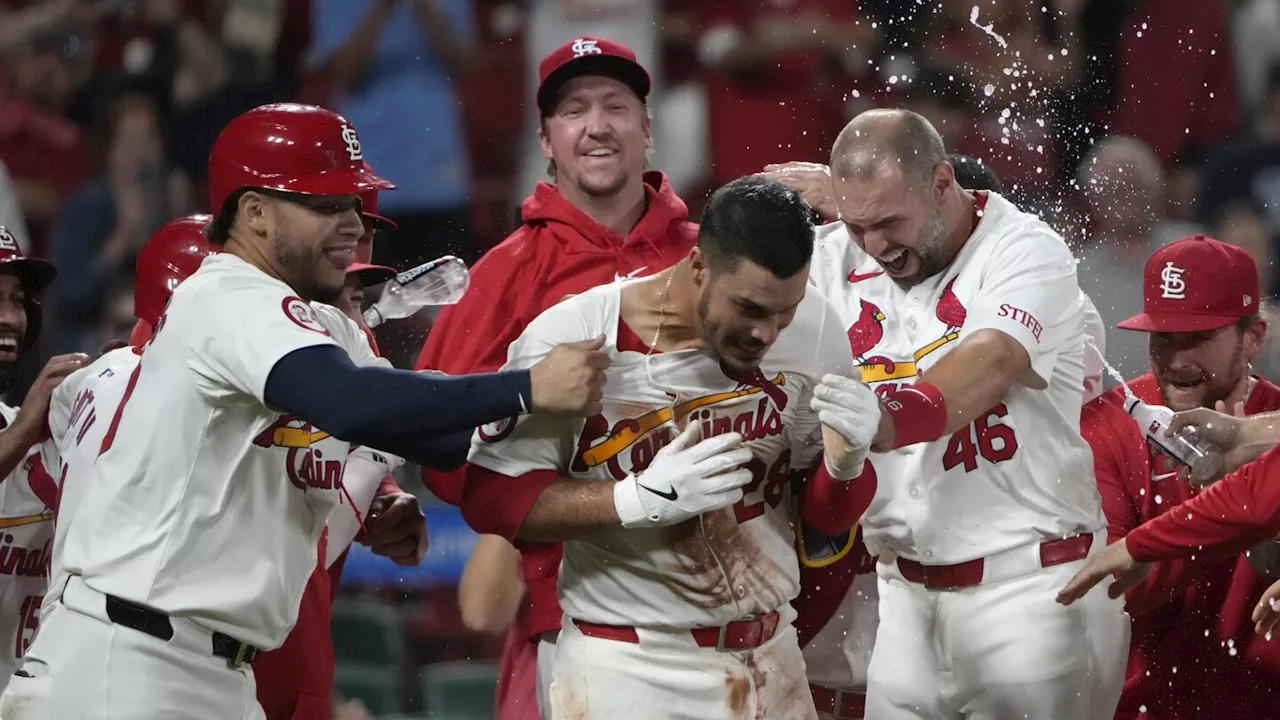 Arenado hits a 10th-inning grand slam to give the Cardinals a 10-6 win over the Brewers