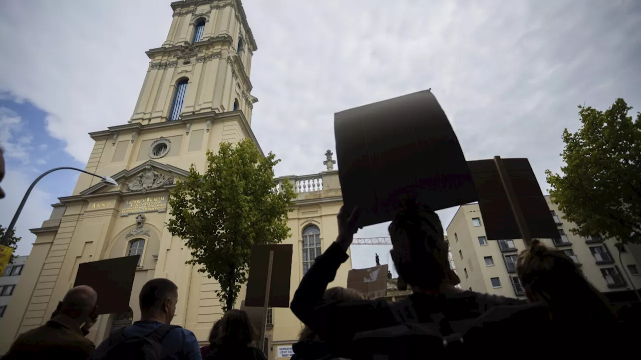 German president inaugurates the rebuilt tower of a church with Nazi-era historical baggage