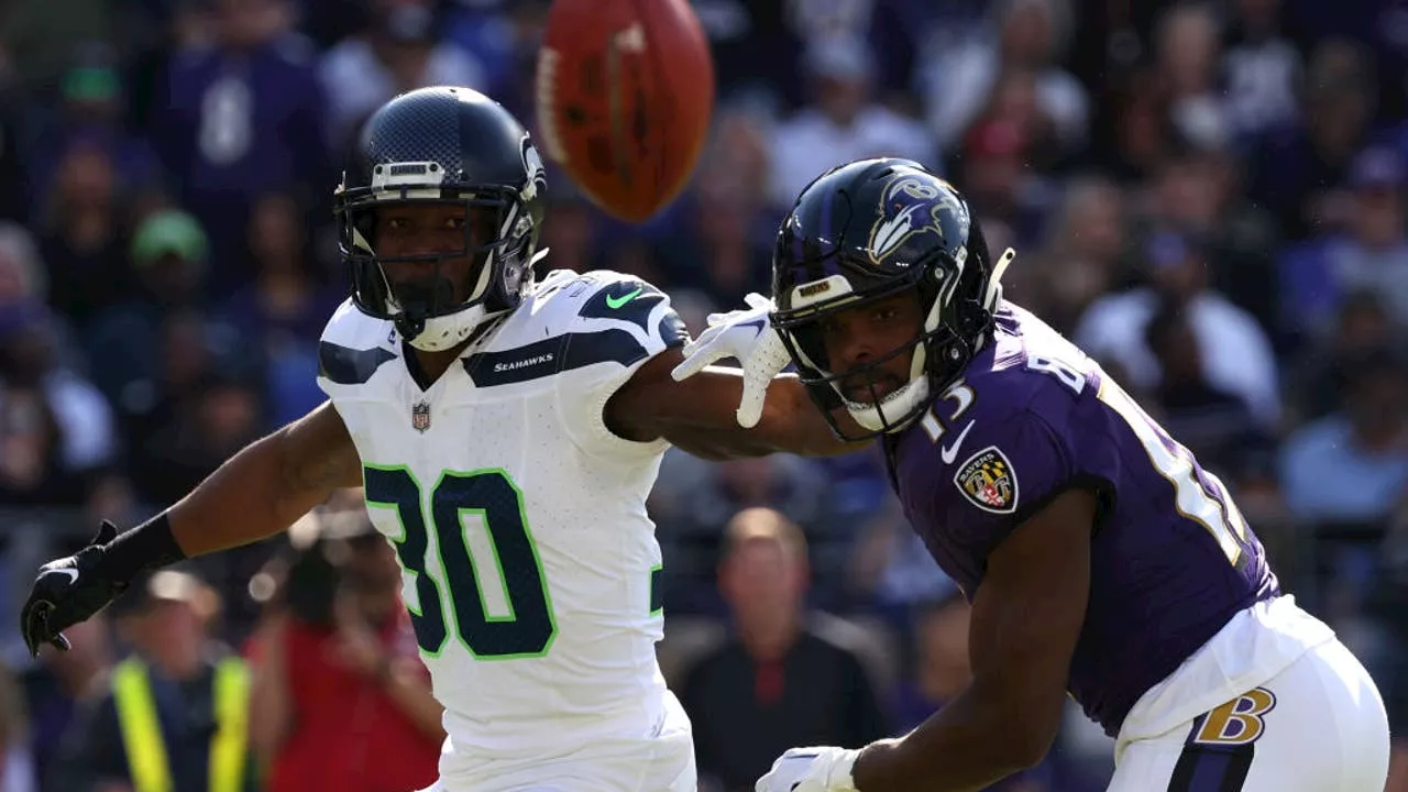 Seattle Seahawks trade CB Michael Jackson to Panthers for LB Michael Barrett