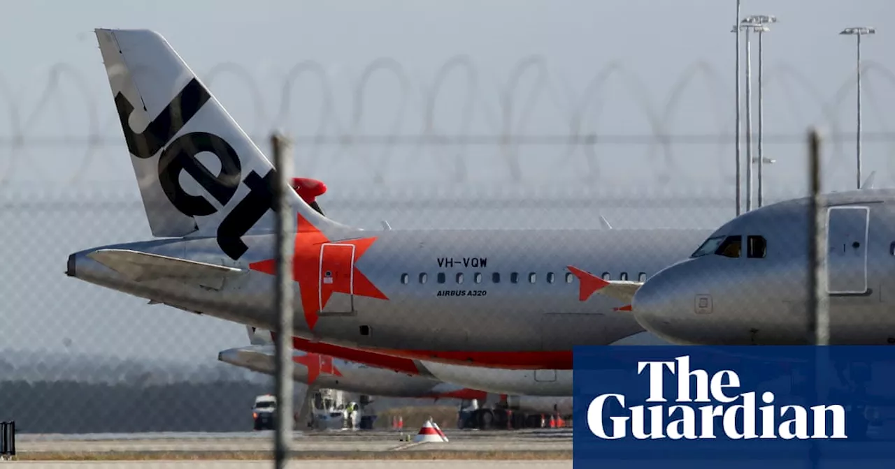 Jetstar passenger arrested on Melbourne airport tarmac after opening plane door and walking on wing