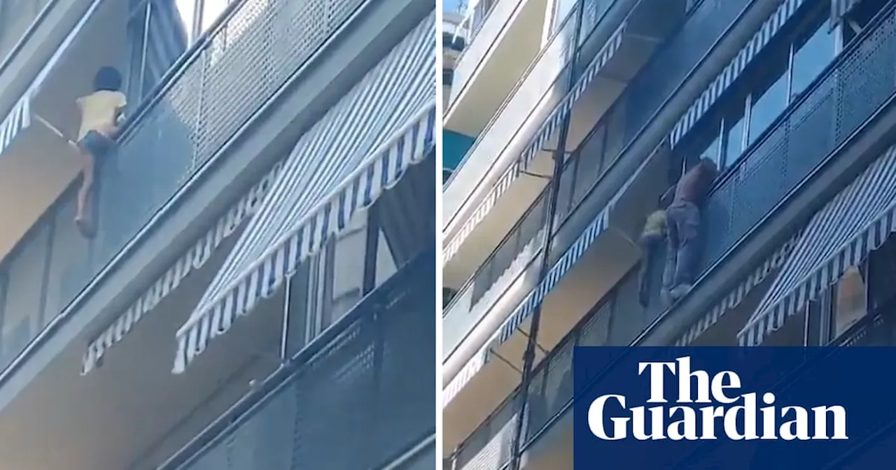 Migrant who saved child from balcony fall in Spain hailed as a hero