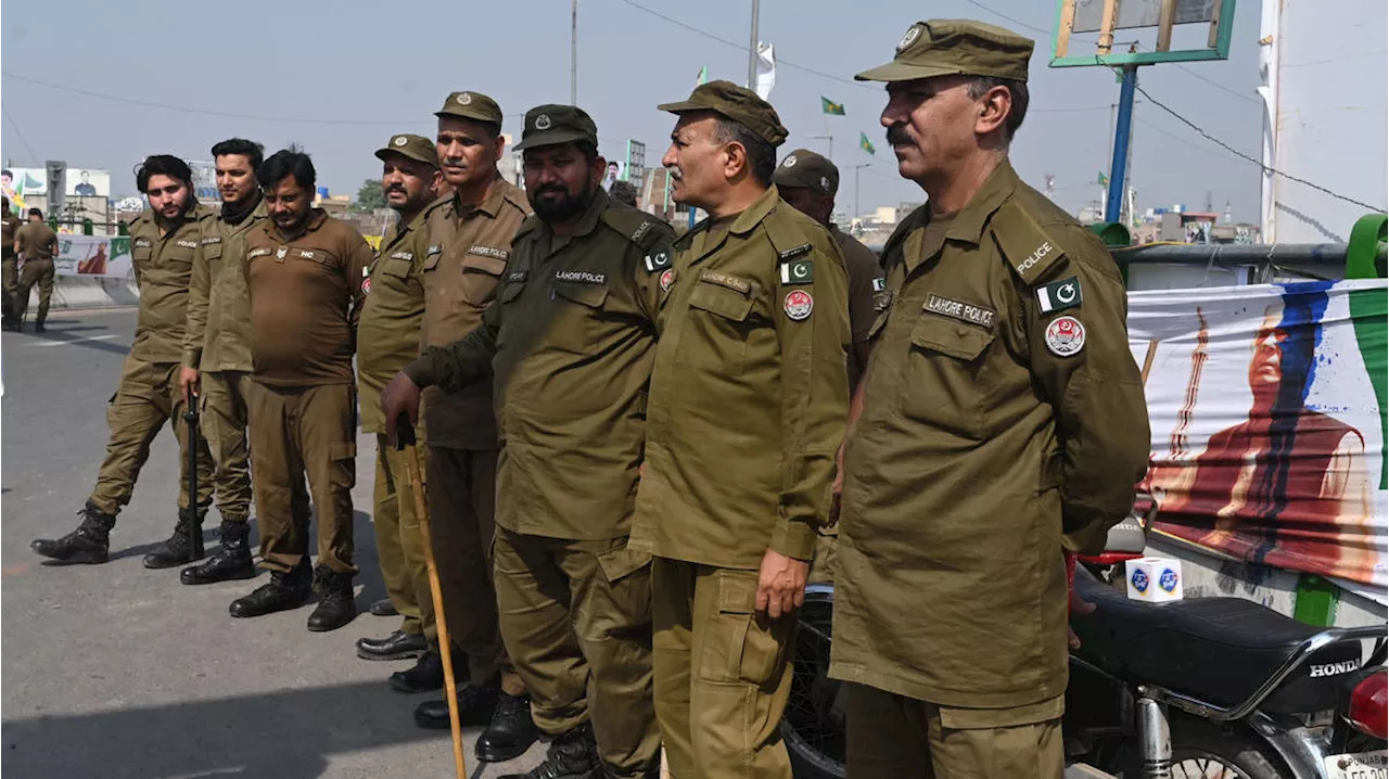 Attackers armed with guns and rocket launchers kill at least 11 police officers in Pakistan ambush