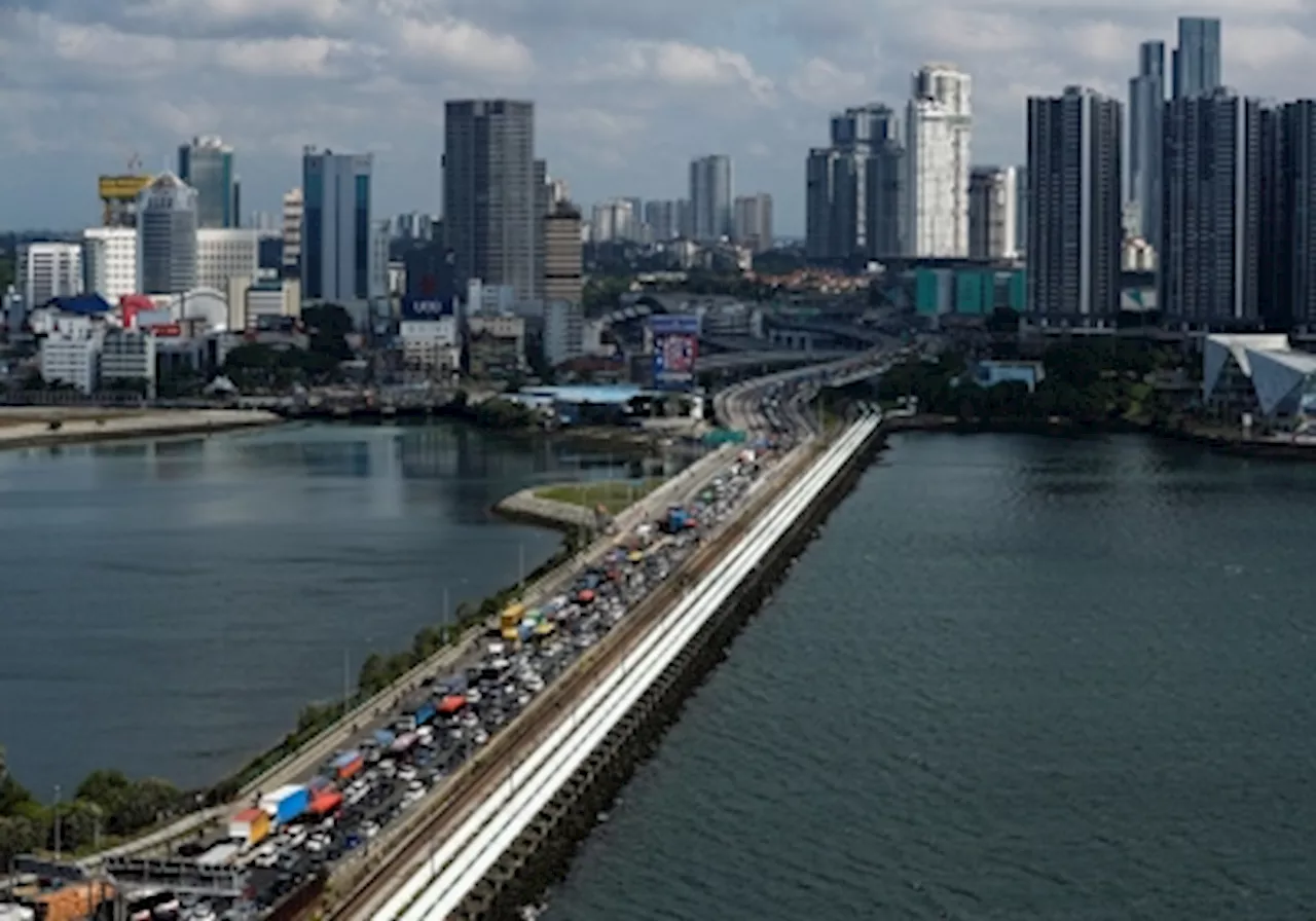 Calling them low-hanging fruit, Khairy says Malaysia-Singapore should have five land crossings, passport-free soft border policy