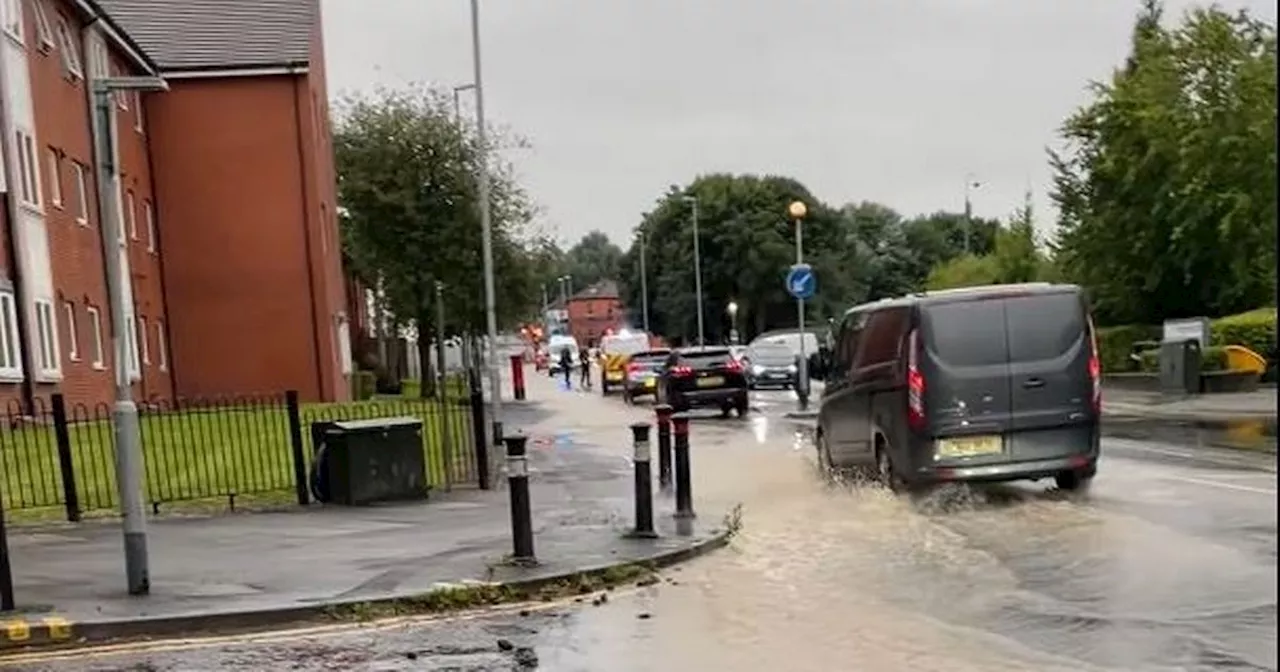 Police shut road outside Greater Manchester hospital amid flooding chaos