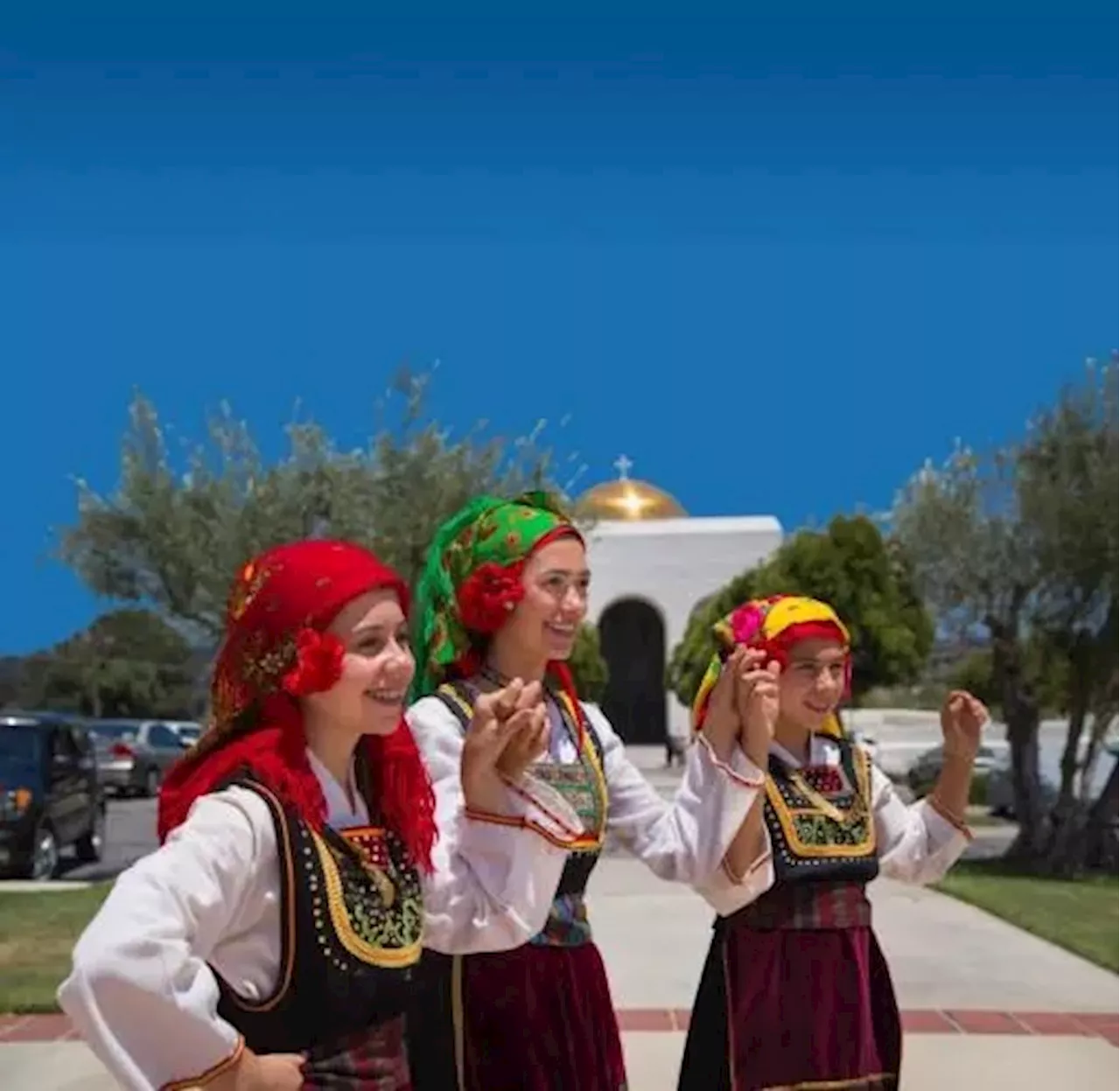 Greek food, music and dance at annual festival in Cardiff at church with golden dome