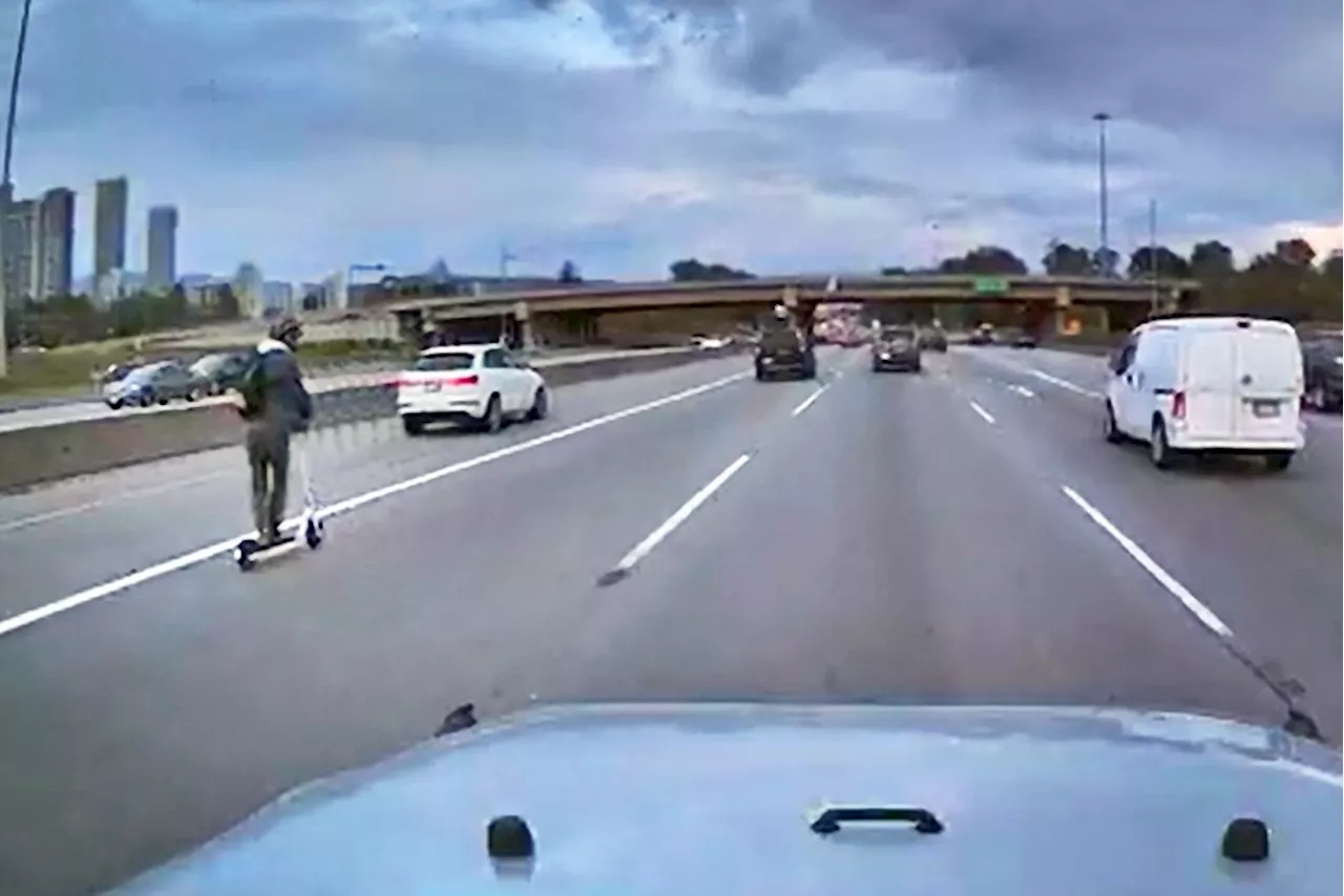 Watch: Man on e-scooter ends up in fast lane on Burnaby freeway