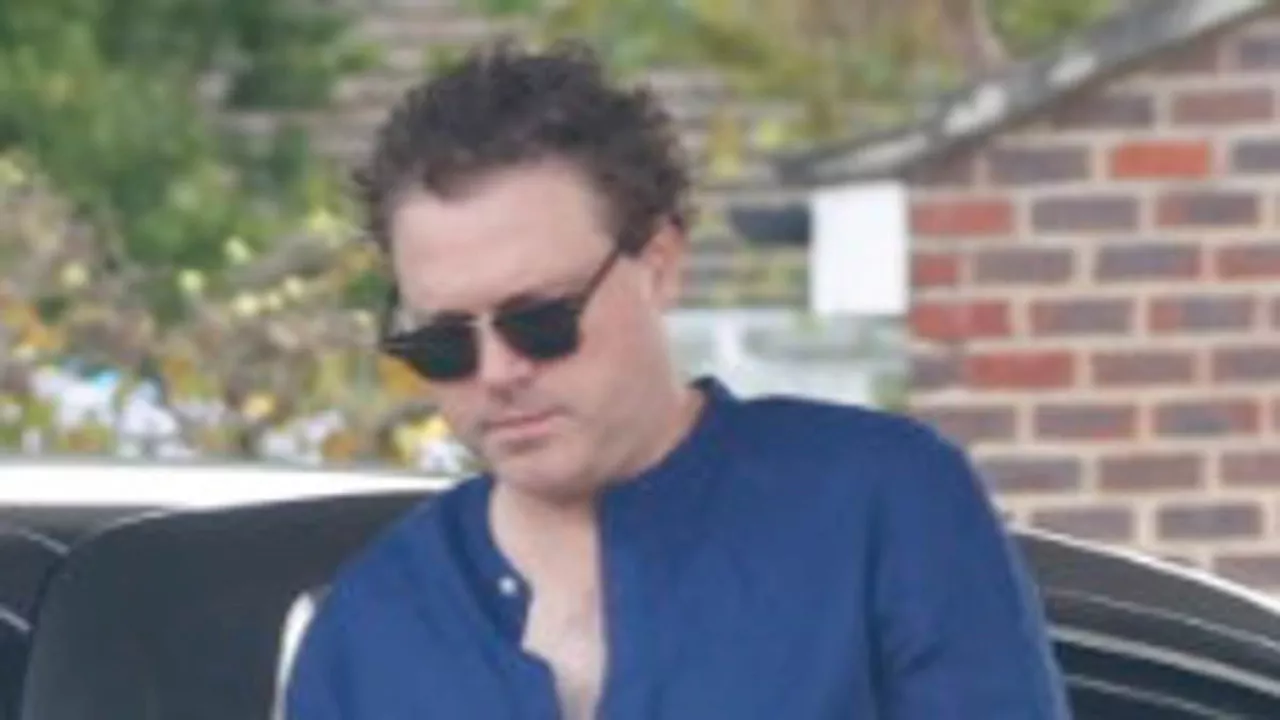 Martine McCutcheon's husband Jack McManus looks strained in first sighting since he broke his...