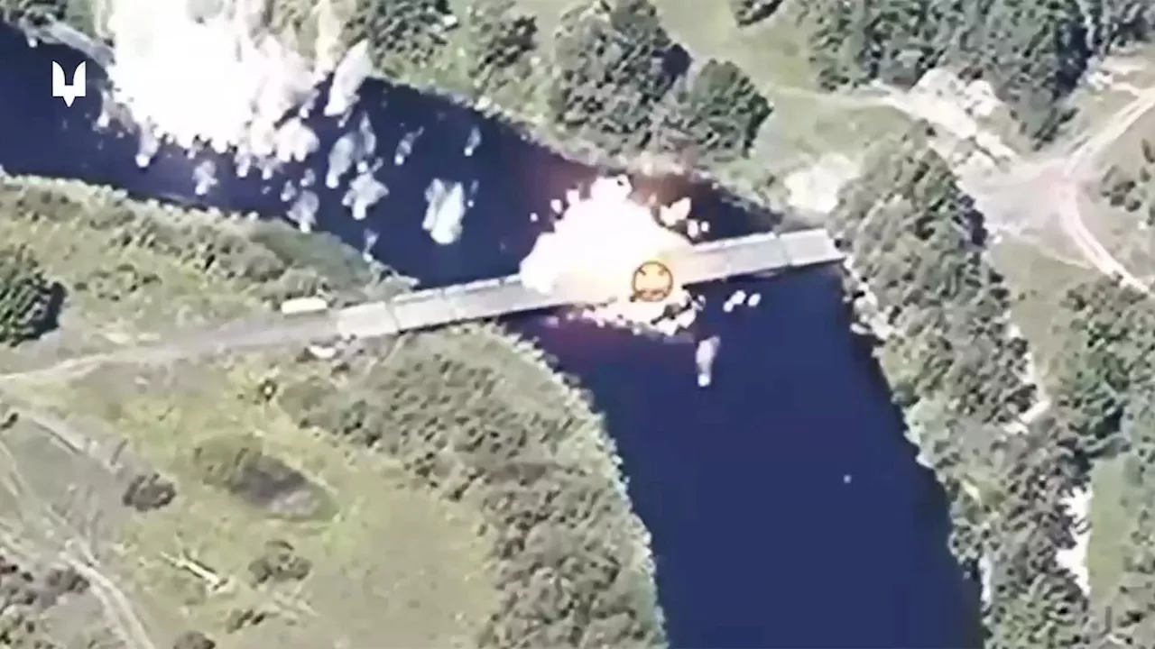 Moment Ukraine forces blow up Russian pontoon bridge with Himars