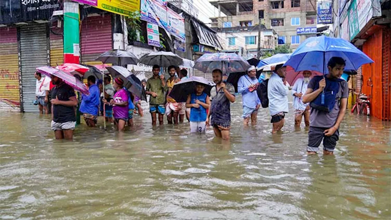 Floods swamp Bangladesh as nation finds its feet after protests