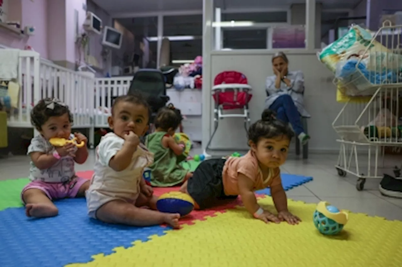 ‘I cry every time’: Gaza mothers fear for newborns stranded in Jerusalem by war, desperate to reunite