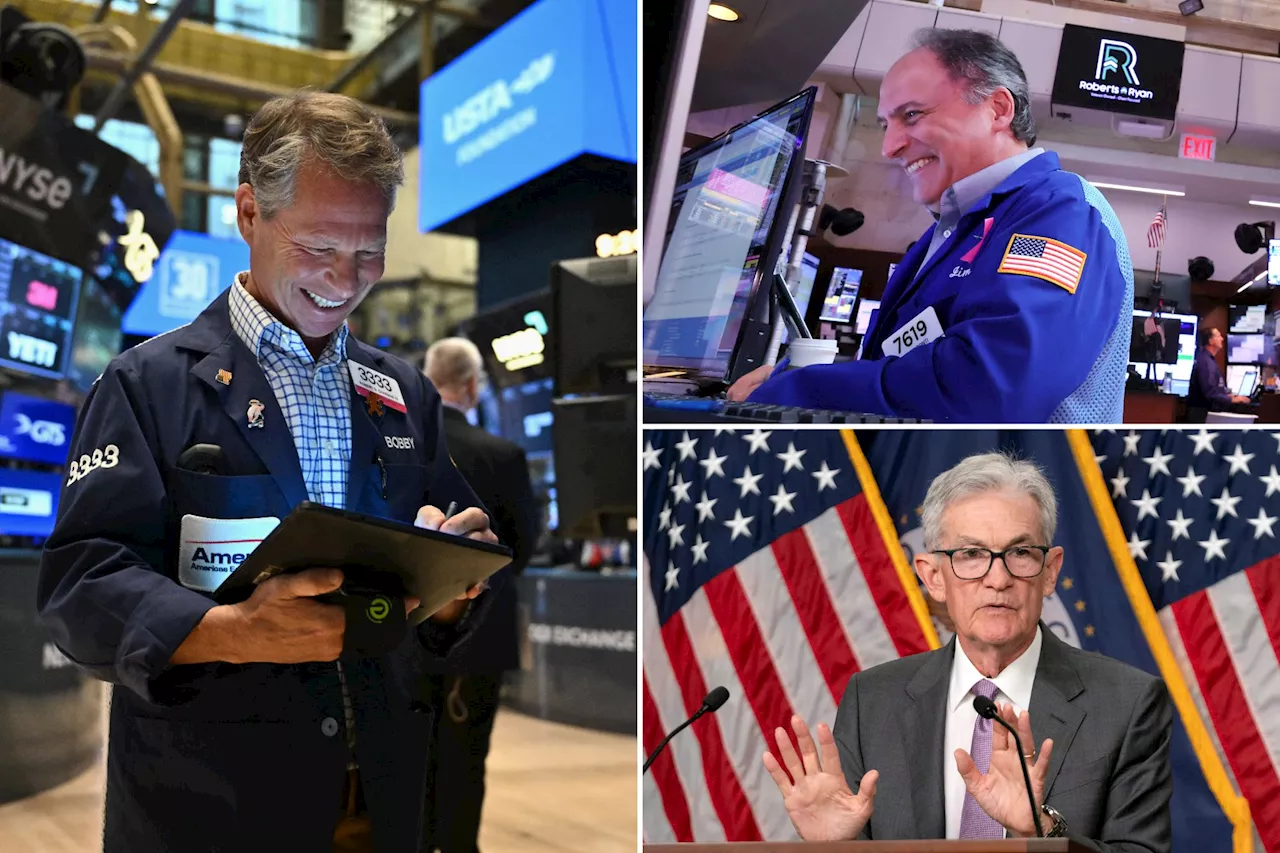 Dow soars over 400 points as Wall Street cheers Fed rate cuts are on the way