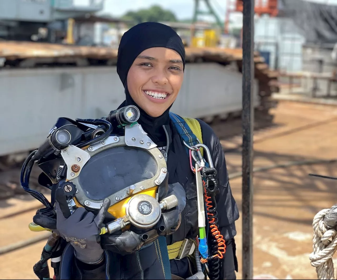 Malaysian woman quits office job to pursue career as a commercial diver