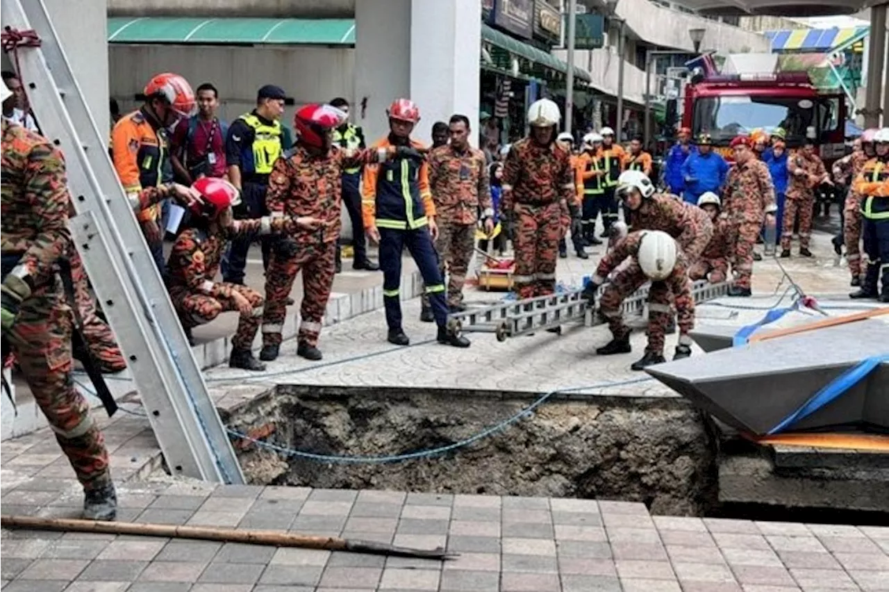 Woman falls into 8m-deep sinkhole in Kuala Lumpur, rescue operation under way