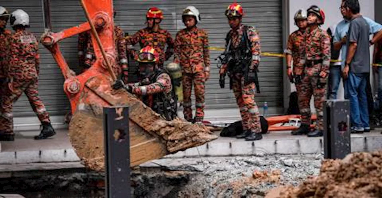 Rescuers widen search for woman missing in sinkhole incident along Jalan Masjid India